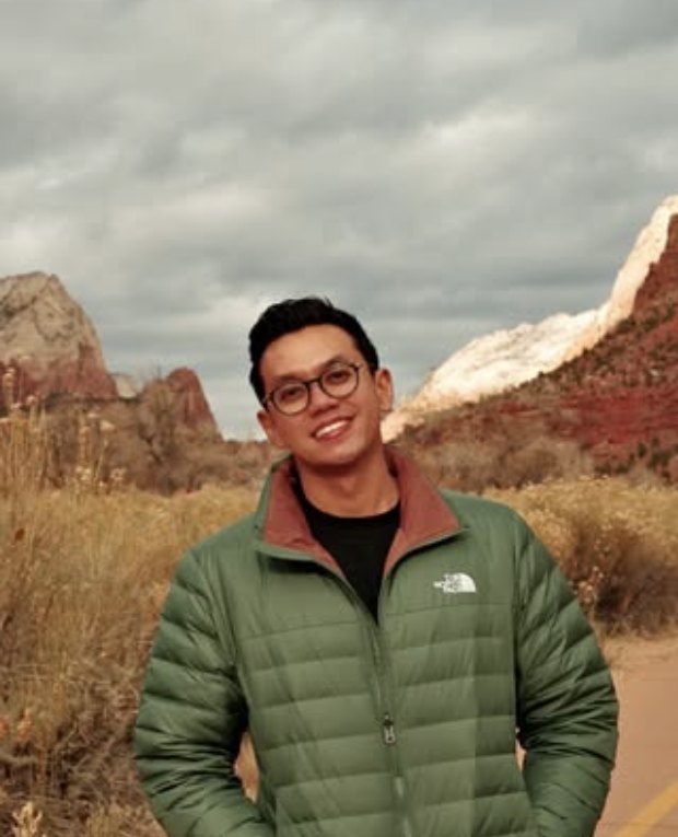 Agung in a green jacket at Zion National Park